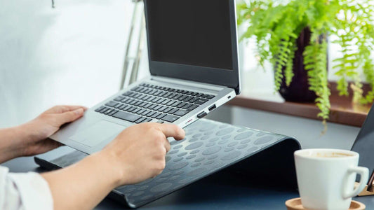 Do I Need a Laptop Stand? Your Complete Guide