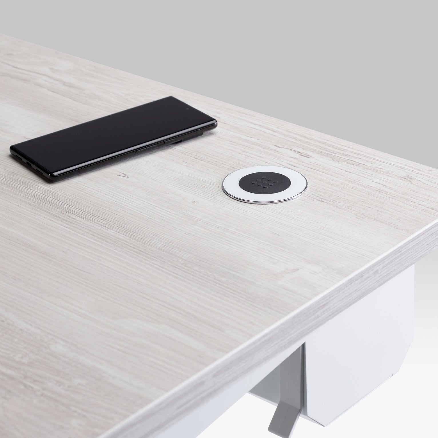 Desktop Wireless Phone Charger in white.