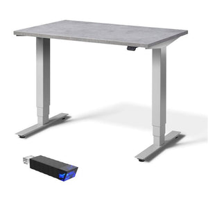 Adjustable small standing desk in anthracite grey.