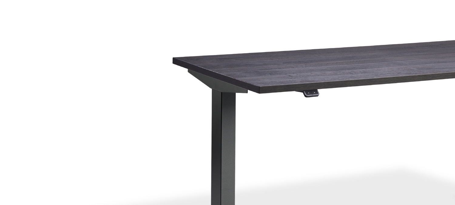 Side view of black standing desk.