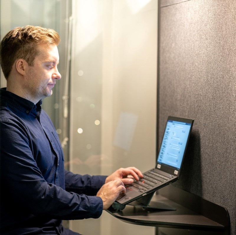 man using Ulrika Black Adjustable Laptop Stand