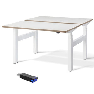Two standing desks connected to a single frame with bluetooth control.