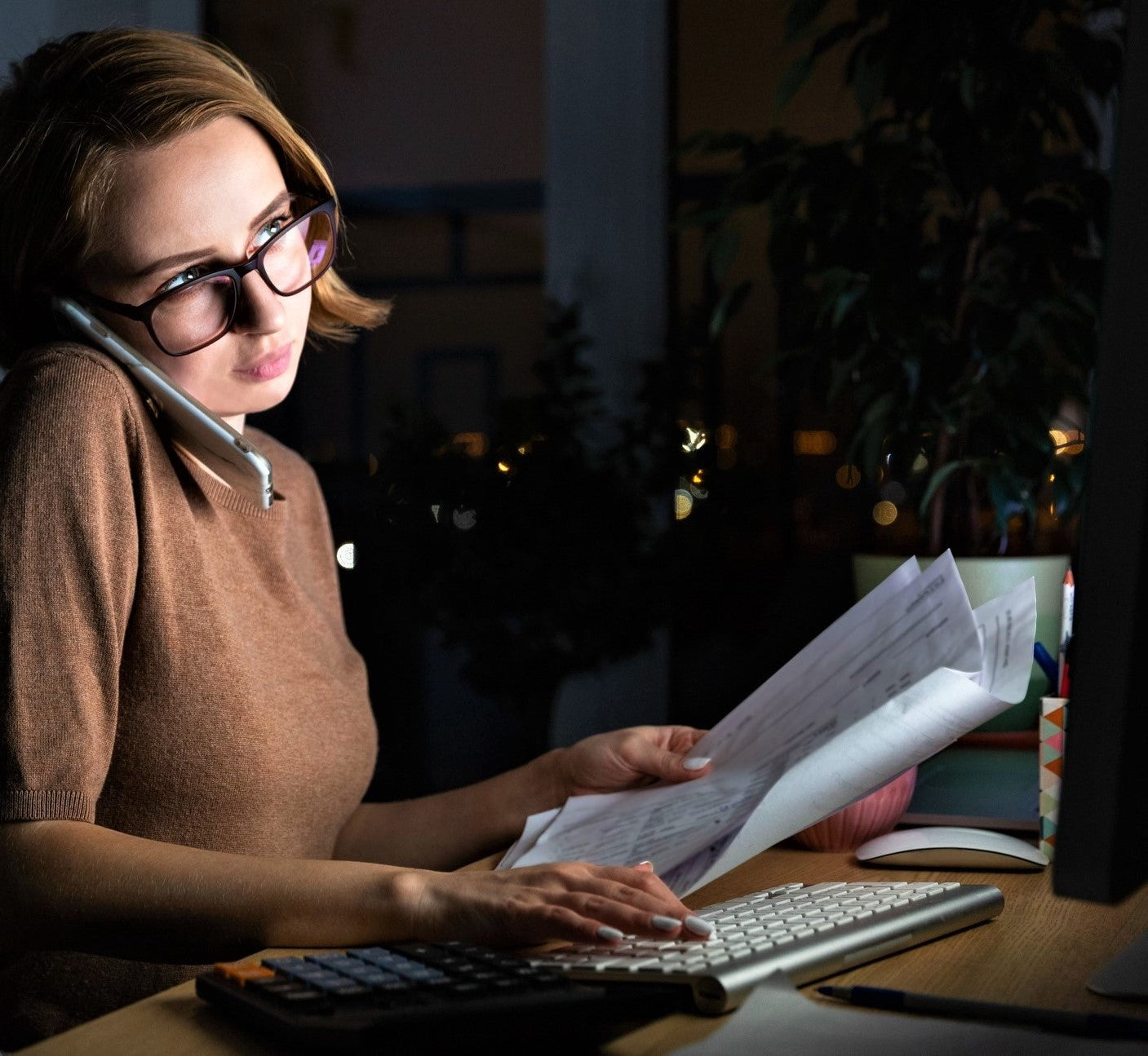 Woman working late at night.