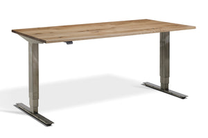 Solid oak standing desk with silver frame.