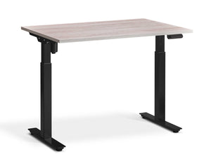Single motor height adjustable desk with pine top.