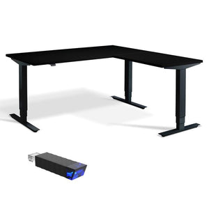 Black l shaped corner height adjustable desk.